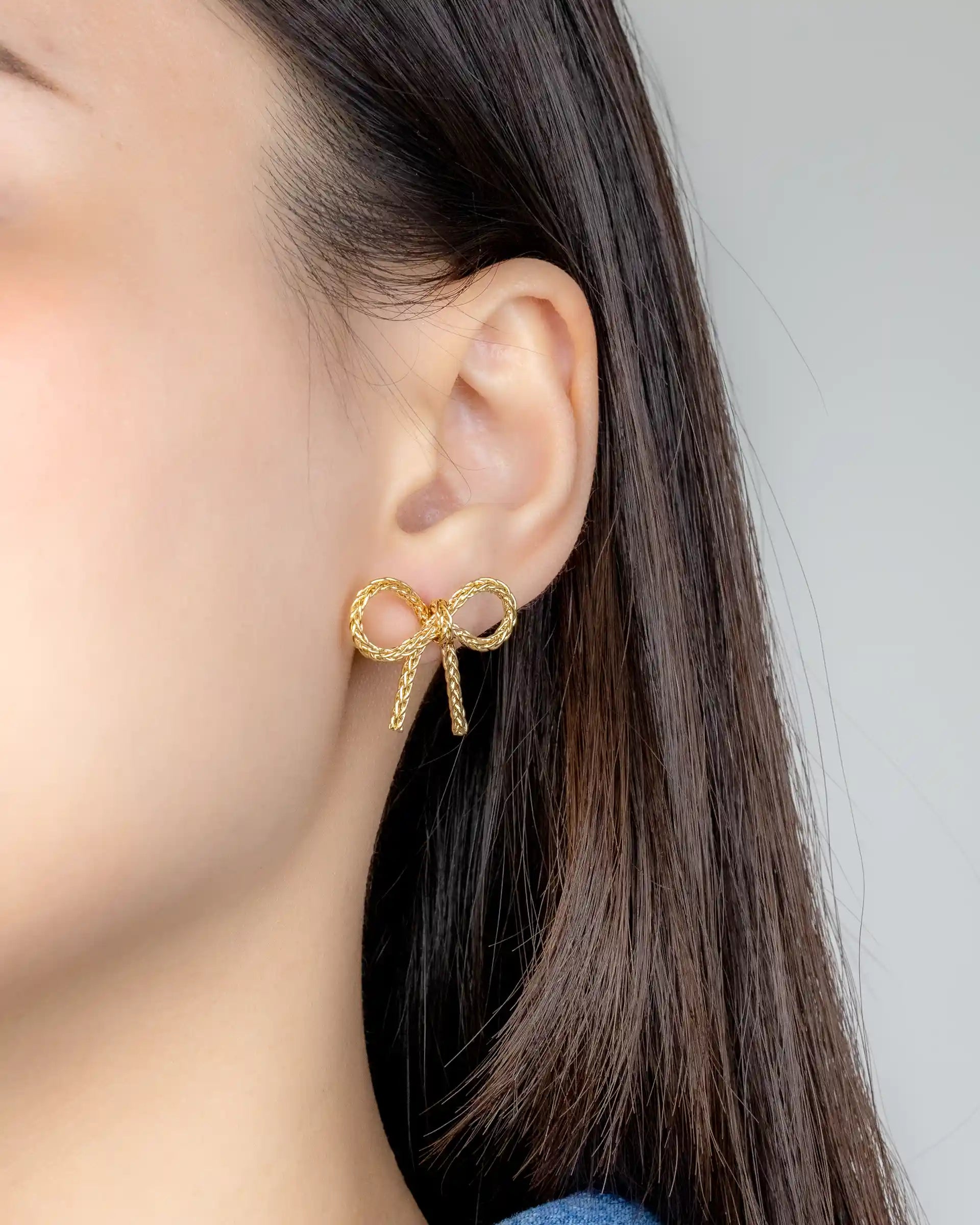 Trisha Bow Stud Earrings in Gold