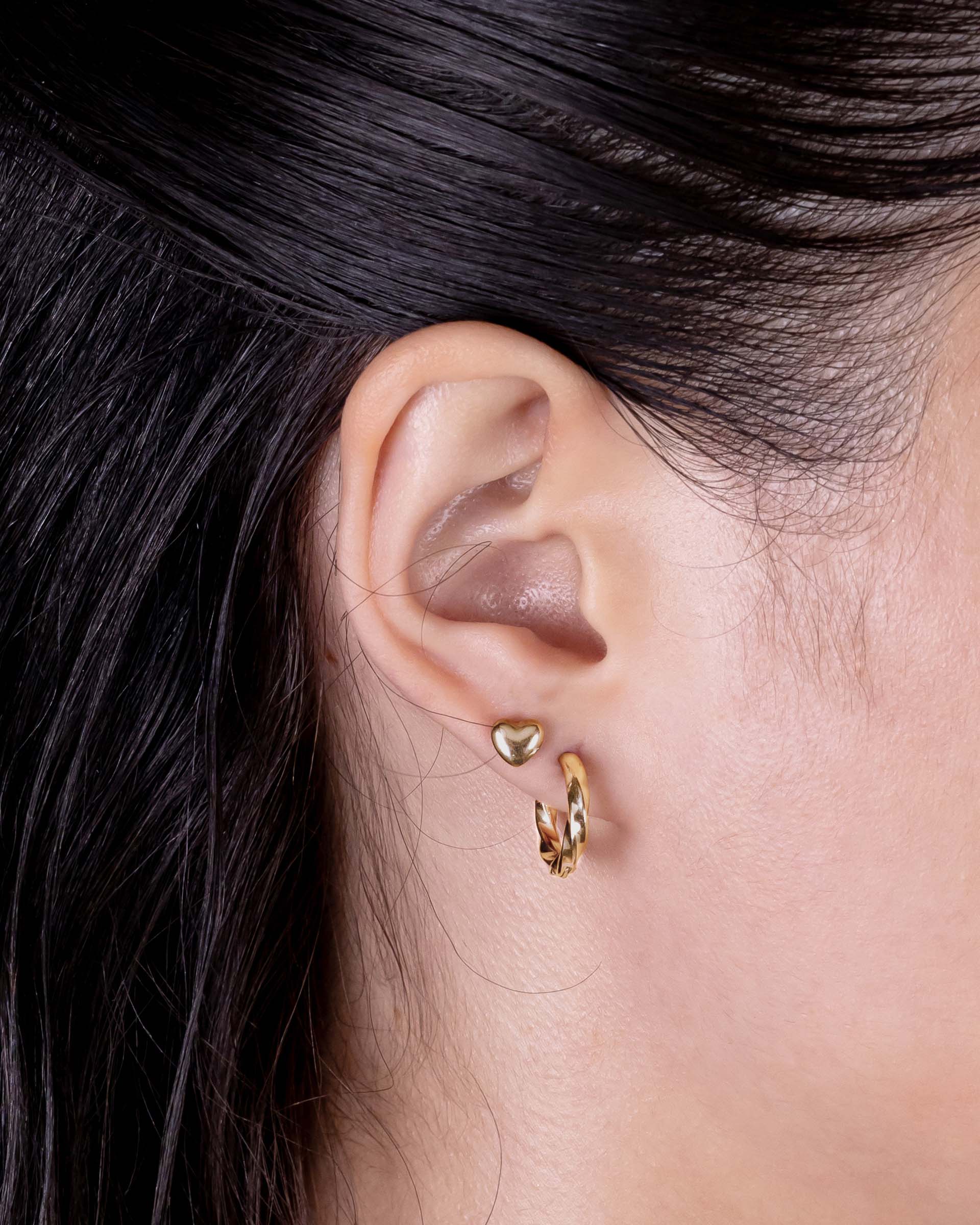 Valery Twisted Hoop Earrings in Gold