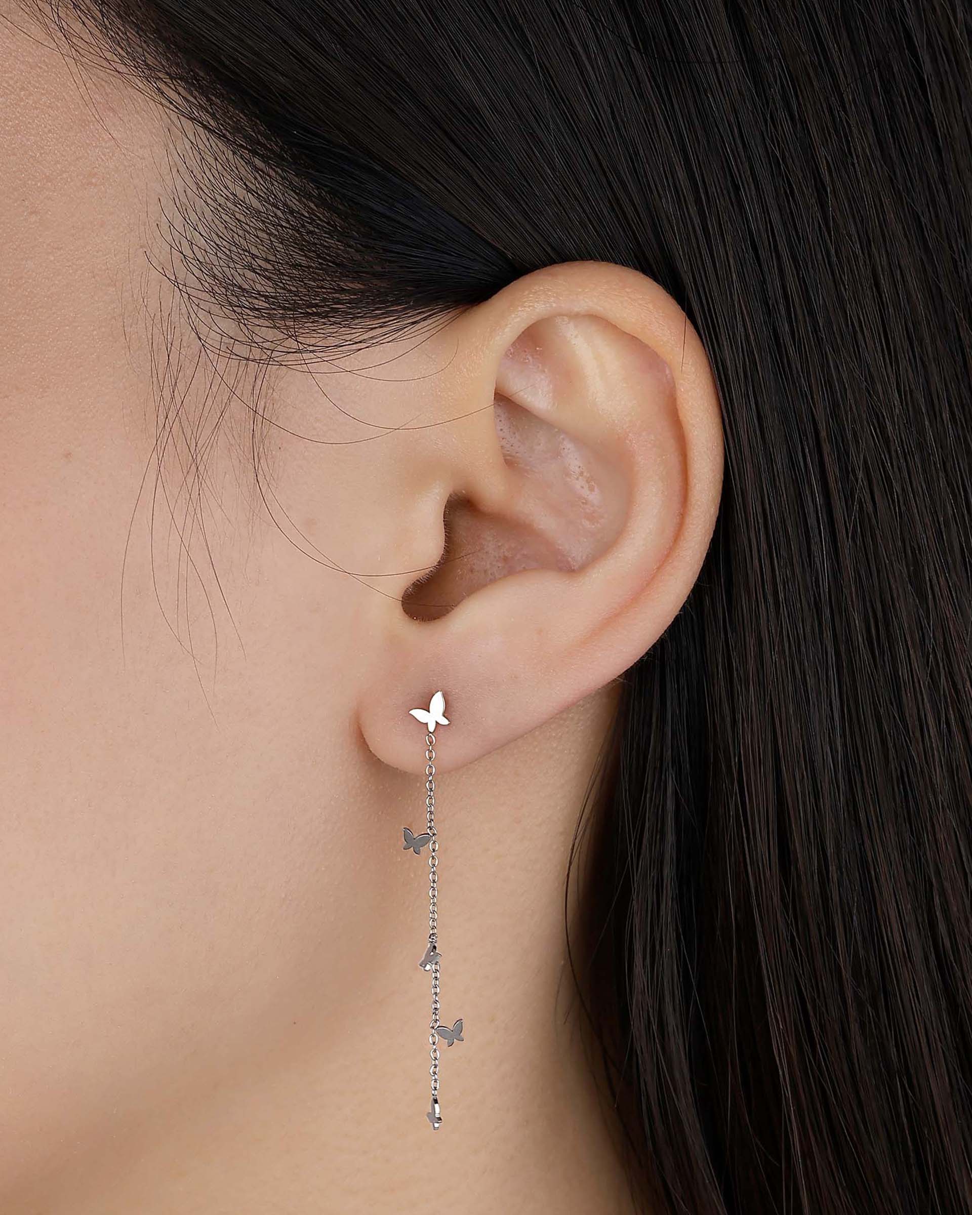 Delilah Dangling Butterfly Earrings in Silver
