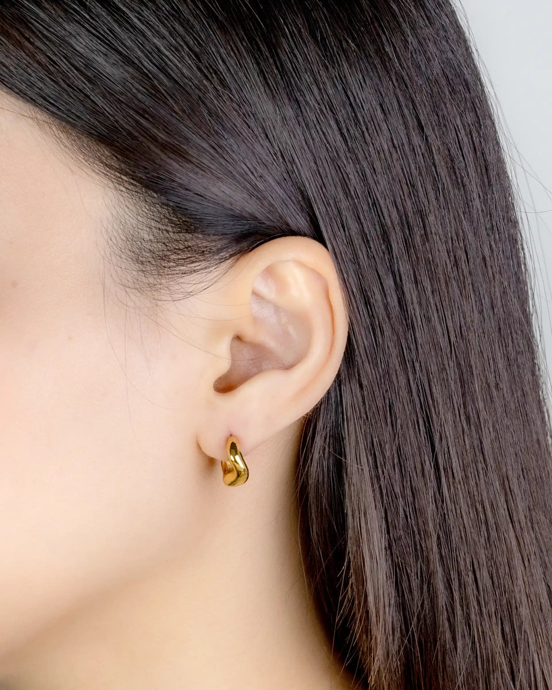 Phyllis Sculptural Huggie Earrings in Gold
