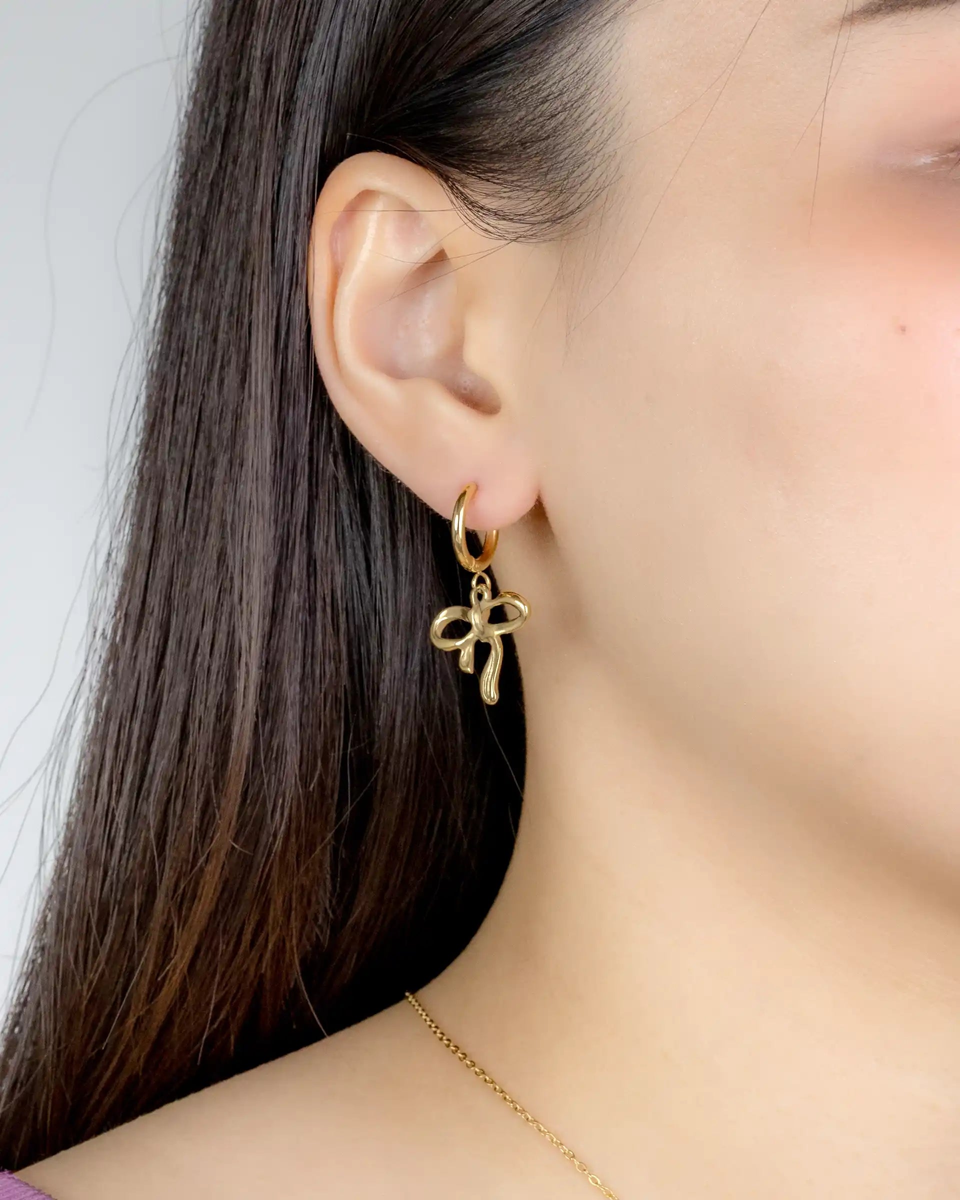 Lela Bow Dangling Hoop Earrings in Gold