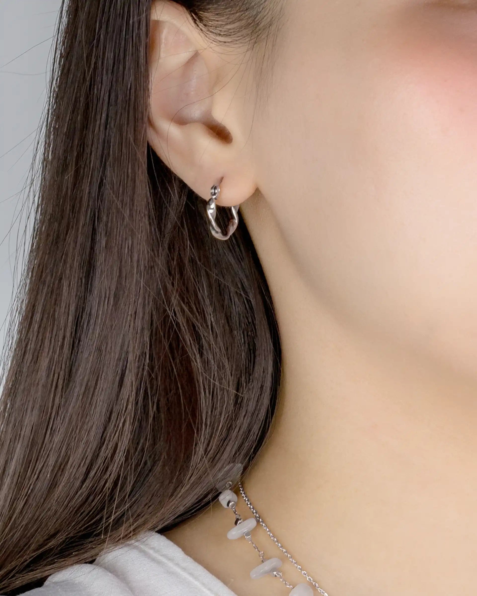 Elly Twisted Hoop Earrings in Silver