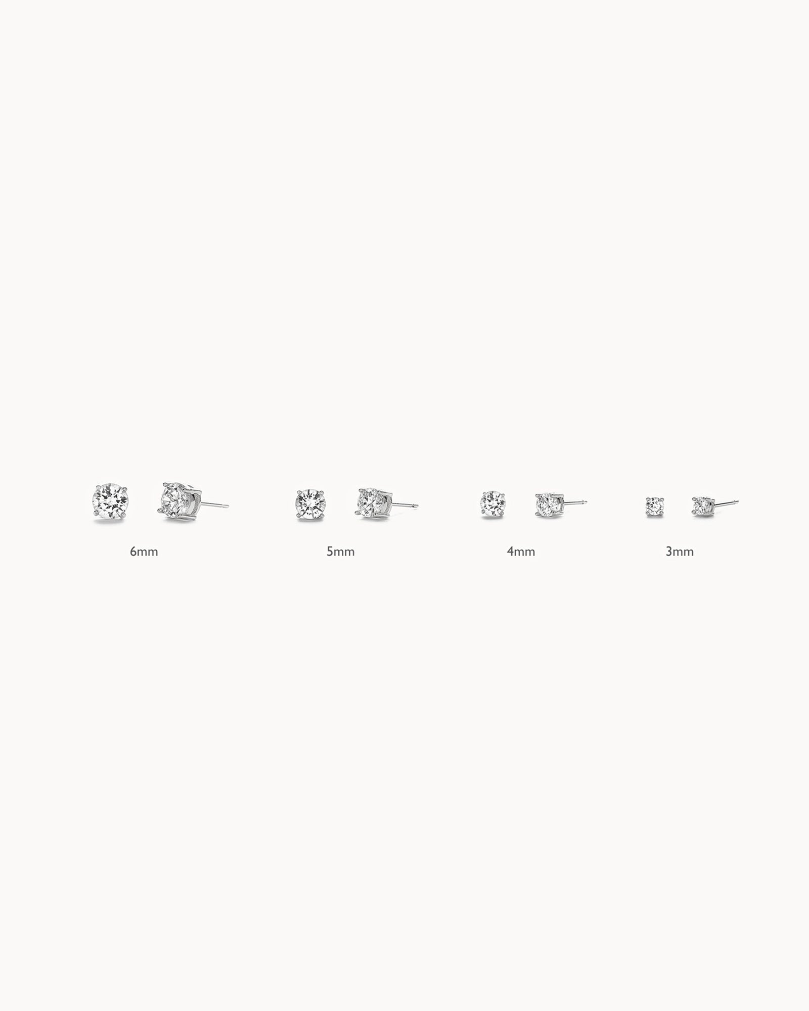 Solitaire Birthstone Earrings in Silver - Diamond